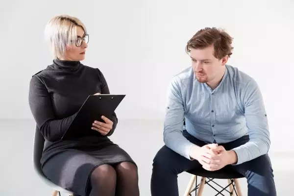 man-talking-with-rehab-doctor